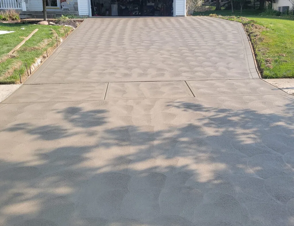 Concrete driveway with a custom swirled finish