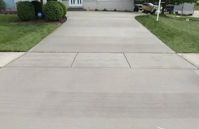 Large Concrete Driveway In Suburban Neighborhood